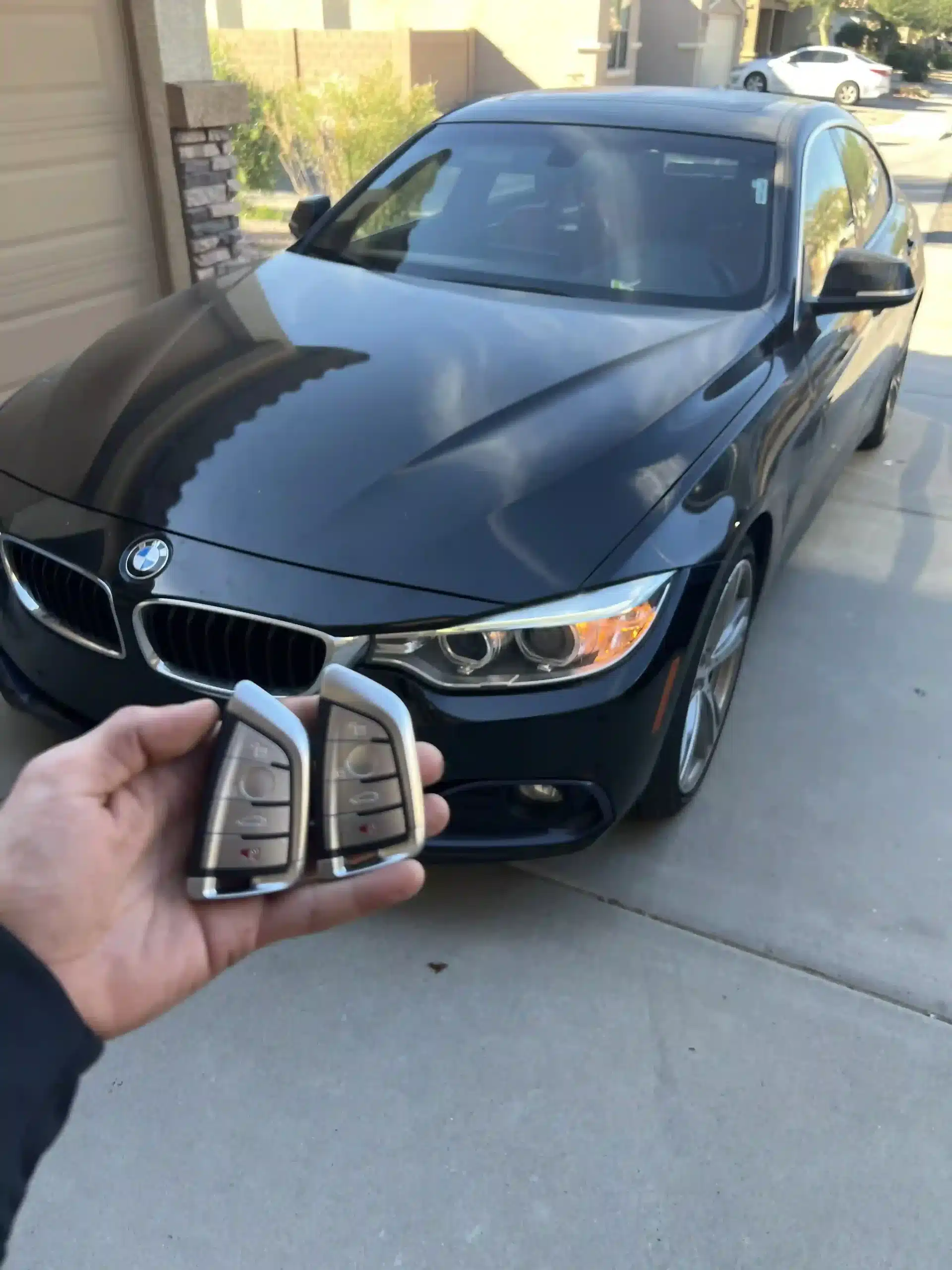 Expert Car locksmith creating and programming a replacement car key