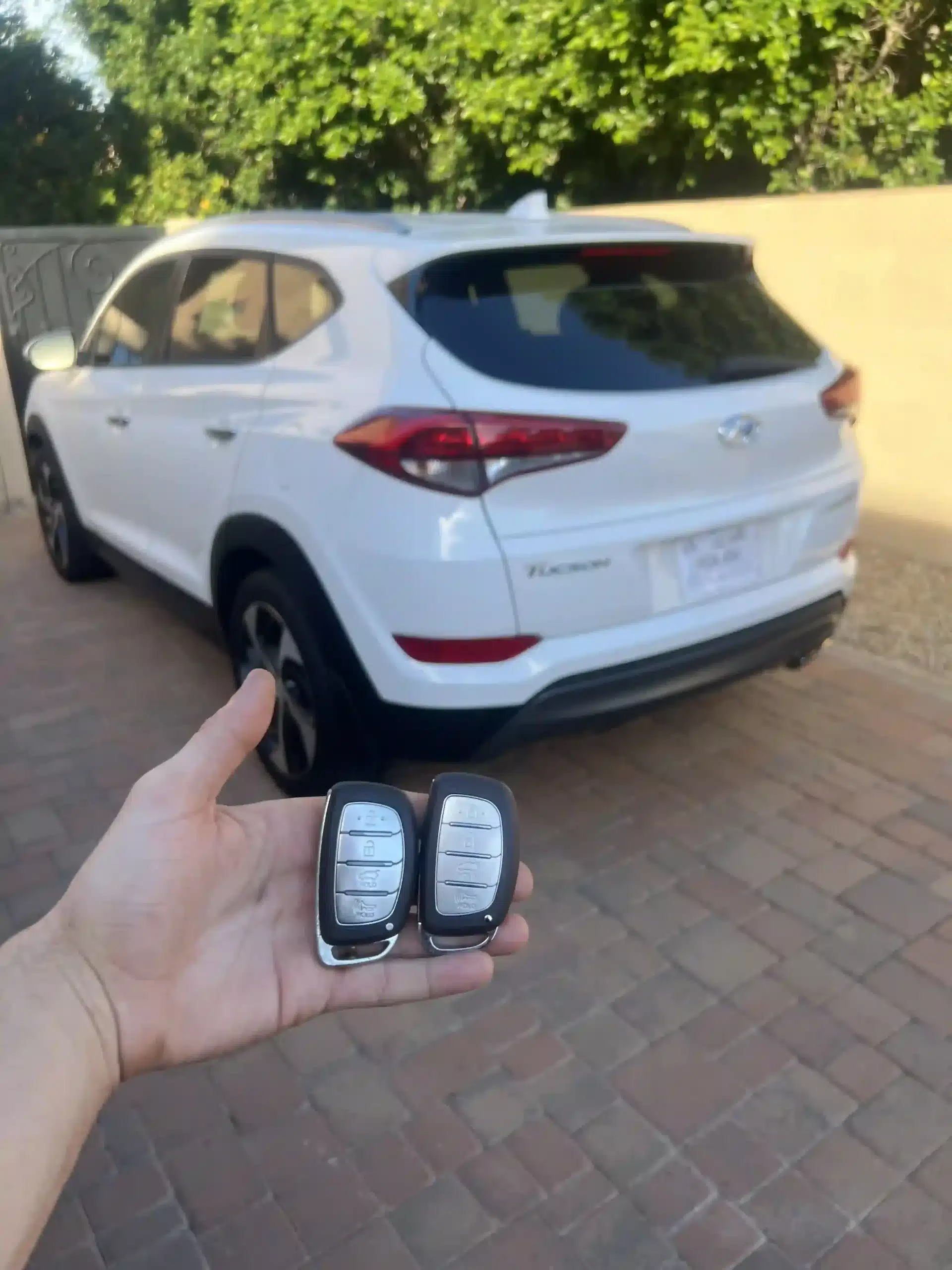Technician providing Locksmith Services in Fountain Hills to unlock a locked car safely without damaging the vehicle